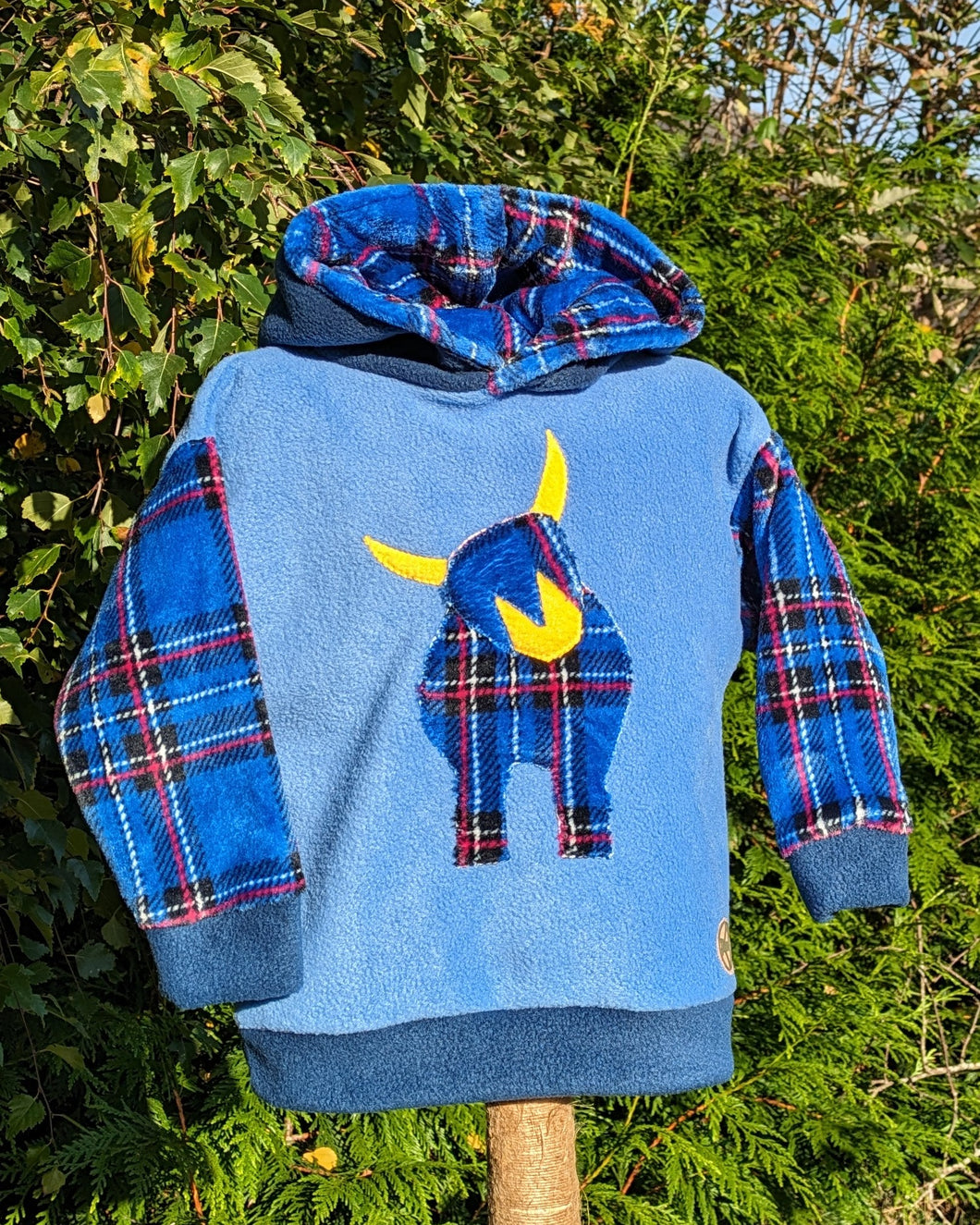 Kid's sky blue fleece hoodie with Highland coo